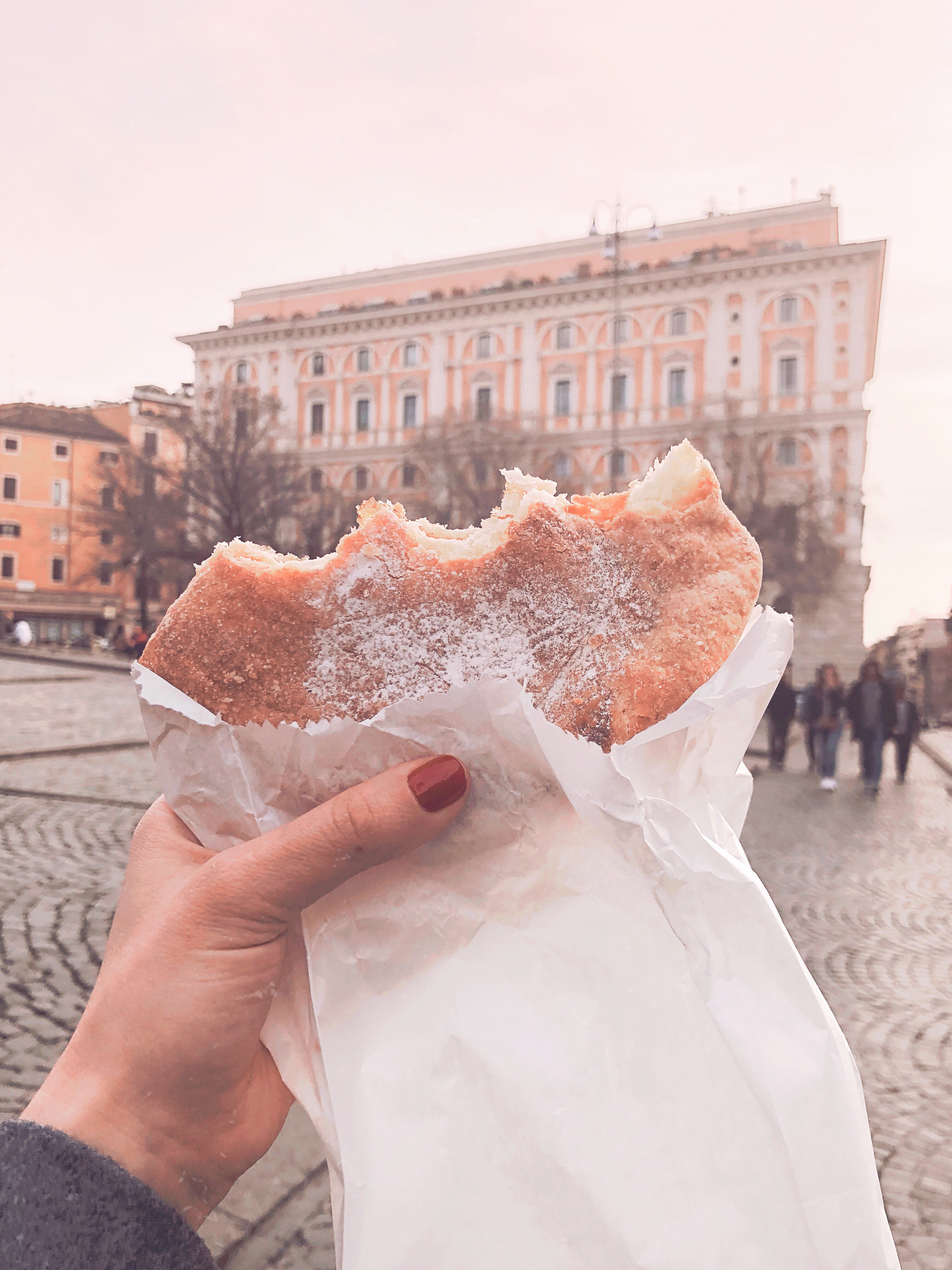 Outside of Princeps Boutique Hotel in Rome Italy with Pastry 